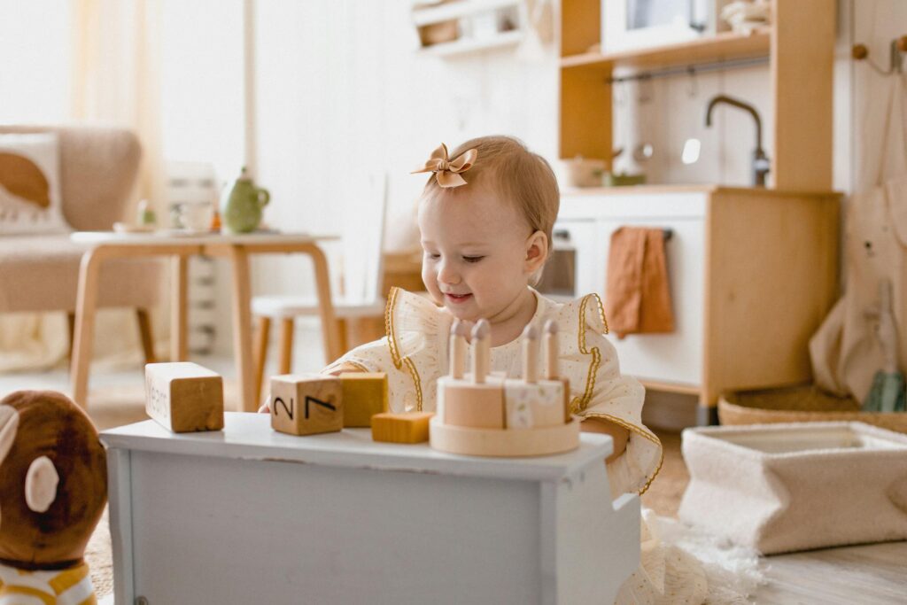 infant playing with development toys