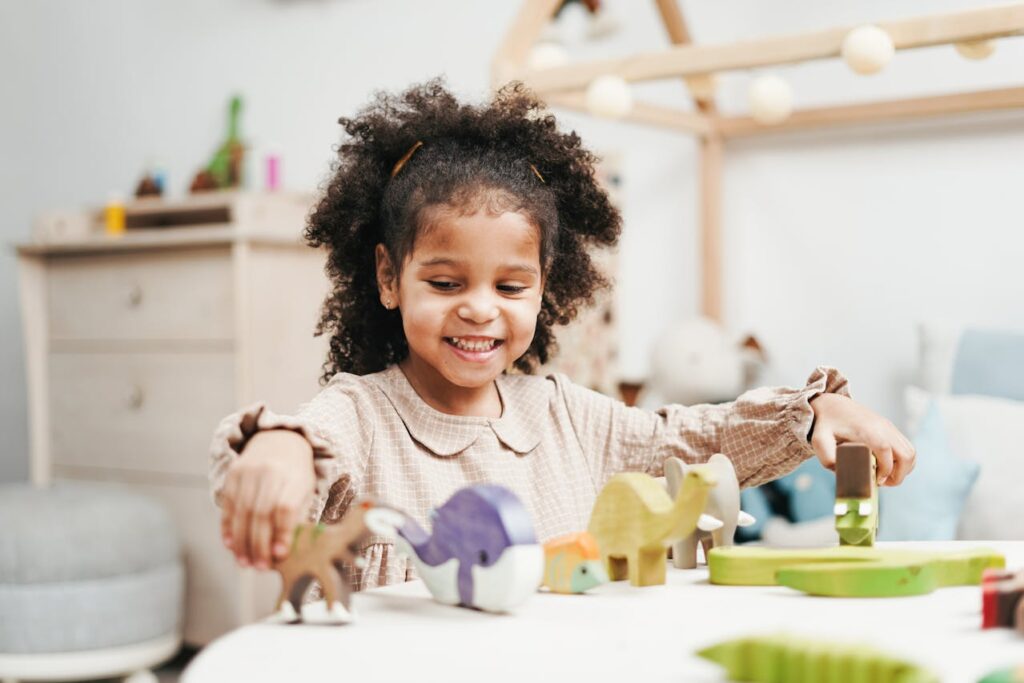 child playing with educational toys